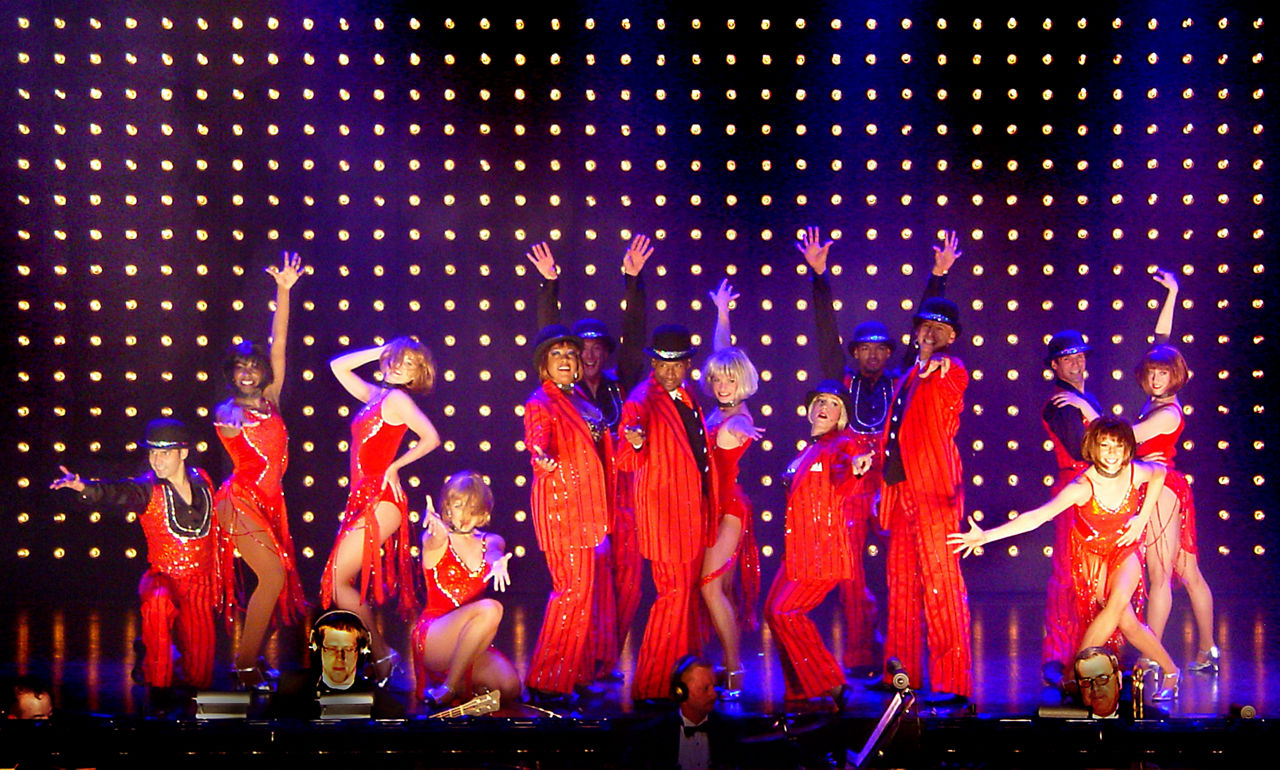 Stage to Screen Cruise Show, Performers Dresses in Red on Stage, Serenade of the Seas