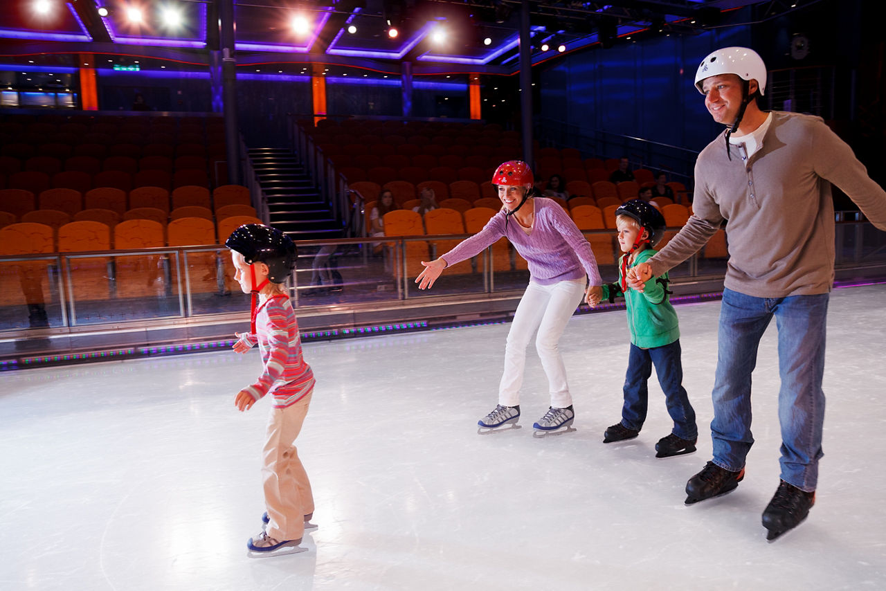 Boy Ice Skating with his Family 