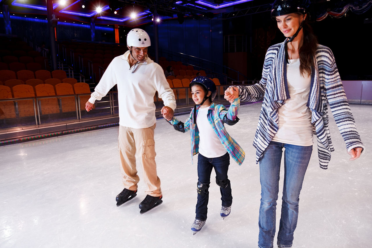 Parents Skating with their Daughter