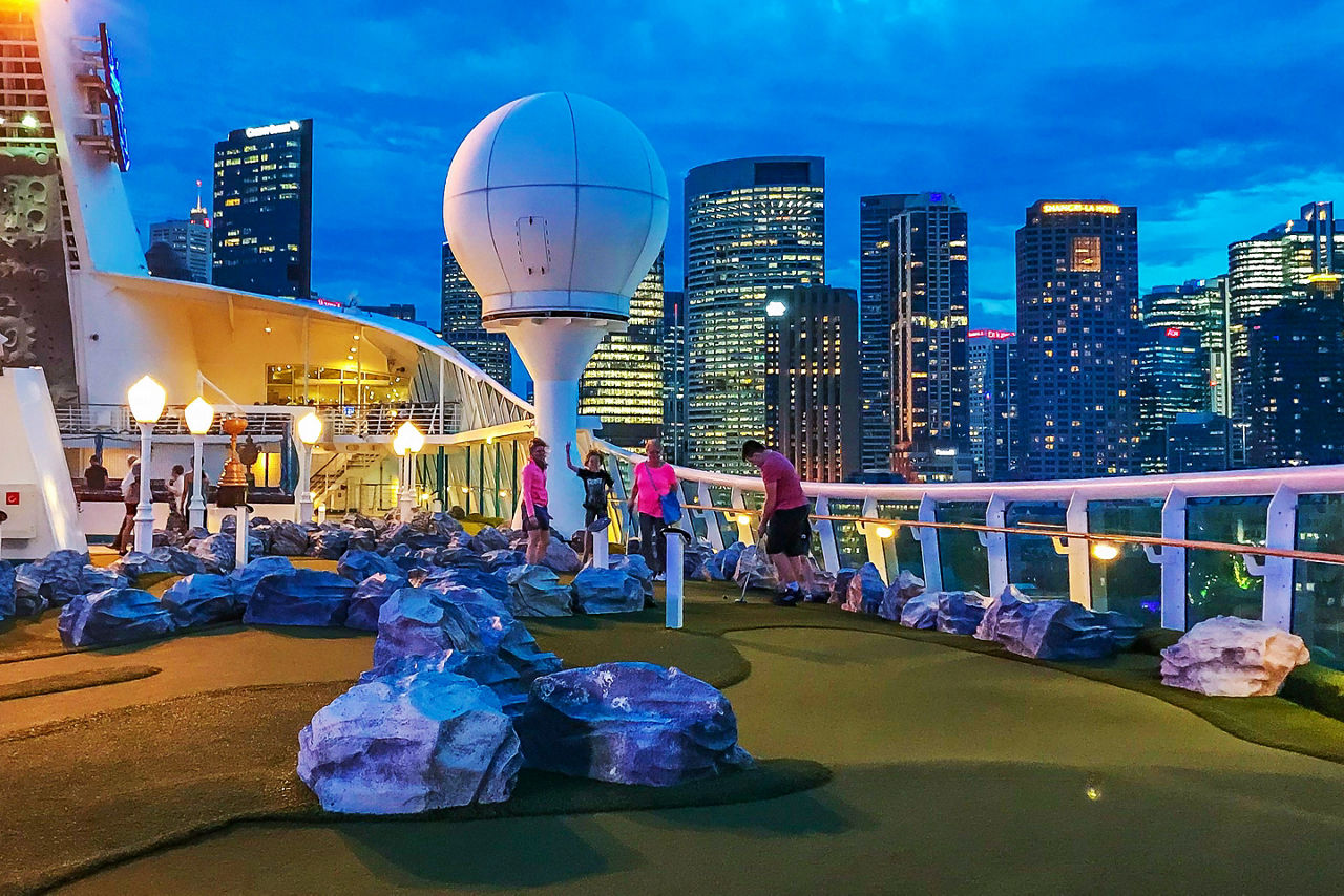 Explorer of the Seas Mini Golf with Sydney Australia in the Background