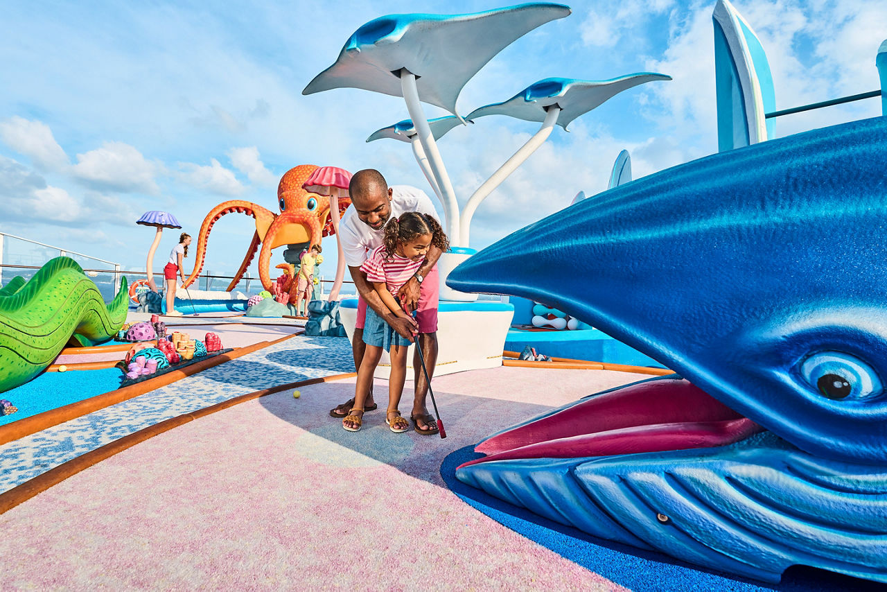 Wonder Dunes Father Teaching Daughter Mini Golf