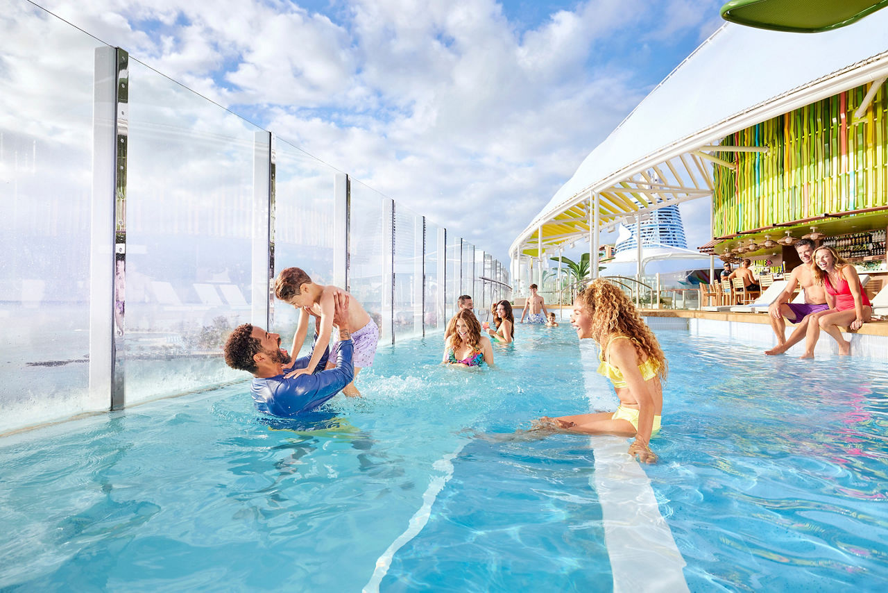 Family Enjoying the Afternoon at the Royal Bay Pool