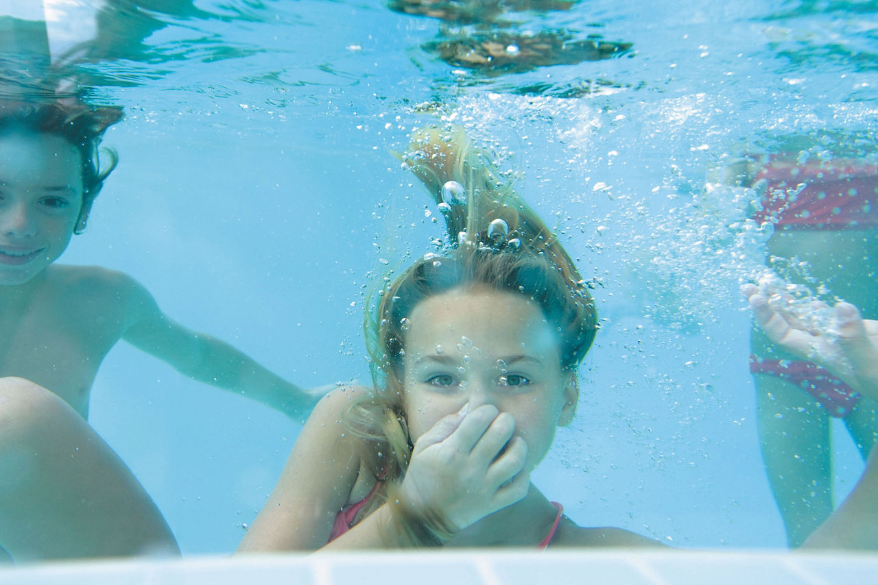 Oasis Pool Girl Diving Under Water