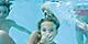 Oasis Pool Girl Diving Under Water