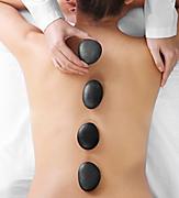 Woman Receiving a Spa Stone Massage 