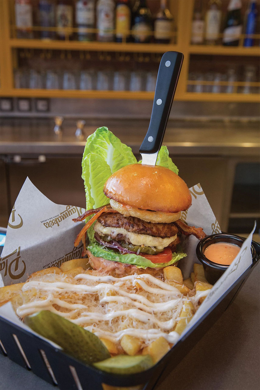 Burger and fries at Playmakers Sports Bar