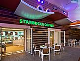 HM, Harmony of the Seas, Starbucks - Deck 6 Portside Aft,  Boardwalk, no people, exterior, entrance to cafe, coffee shop, signage, tables, chairs,
