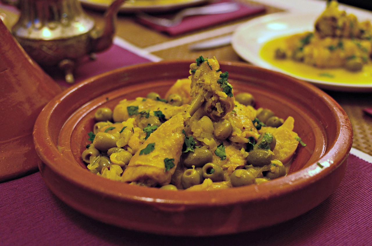 Local cuisine in Abu Dhabi is chicken tagine with preserved lemon and green olives