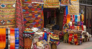 A shop in Agadir, Morocco selling colorful fabrics