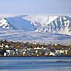 View of Akureyri, Iceland with ice covered mountains in the background
