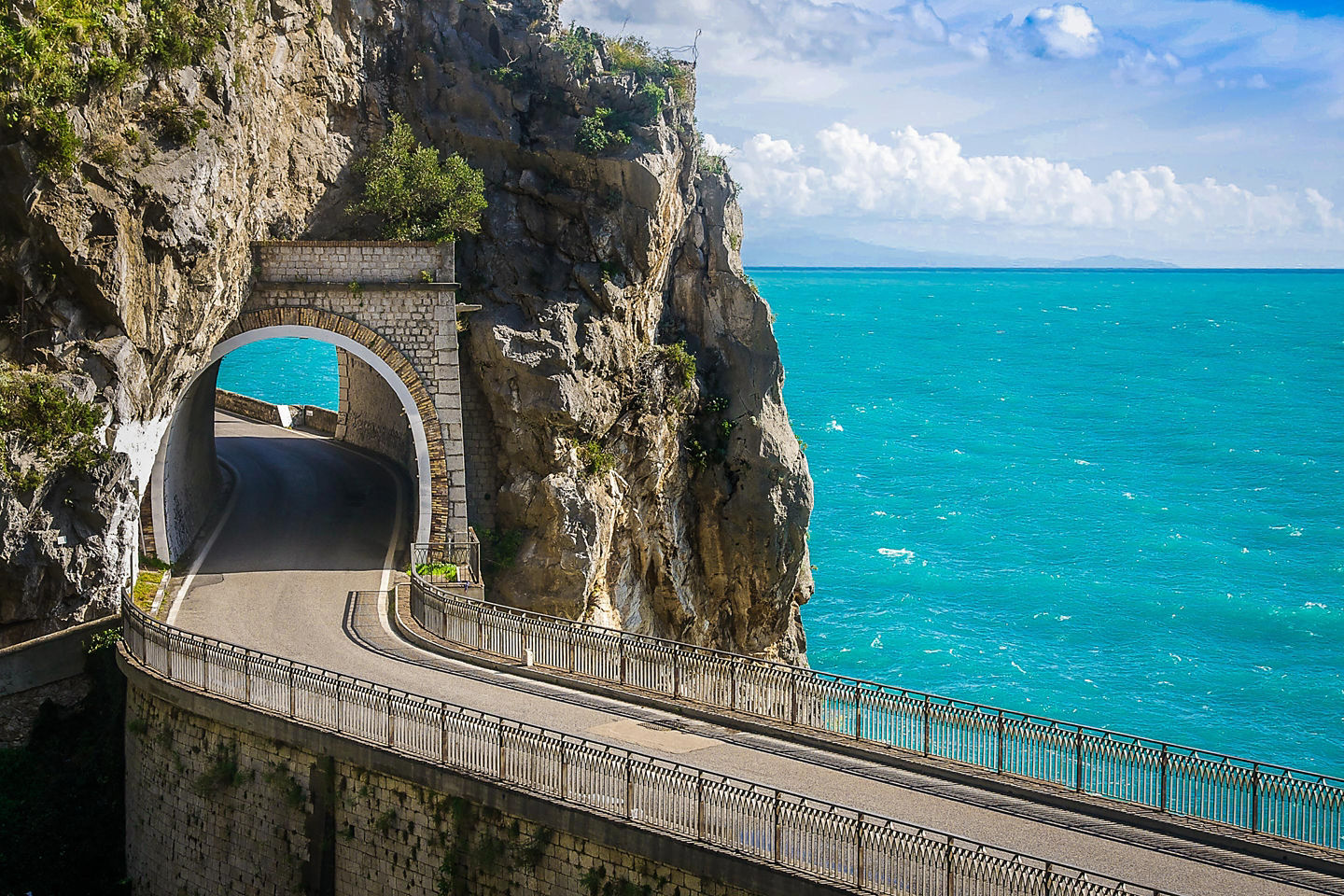 The Amalfi Drive offers sweeping coastal views, cliffside villages, and unforgettable scenery along its route. - Amalfi Coast, Italy