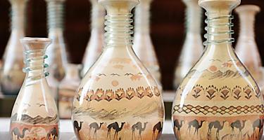 Bottles made of shape with shapes of deserts and camels while shopping in Aqaba, Jordan