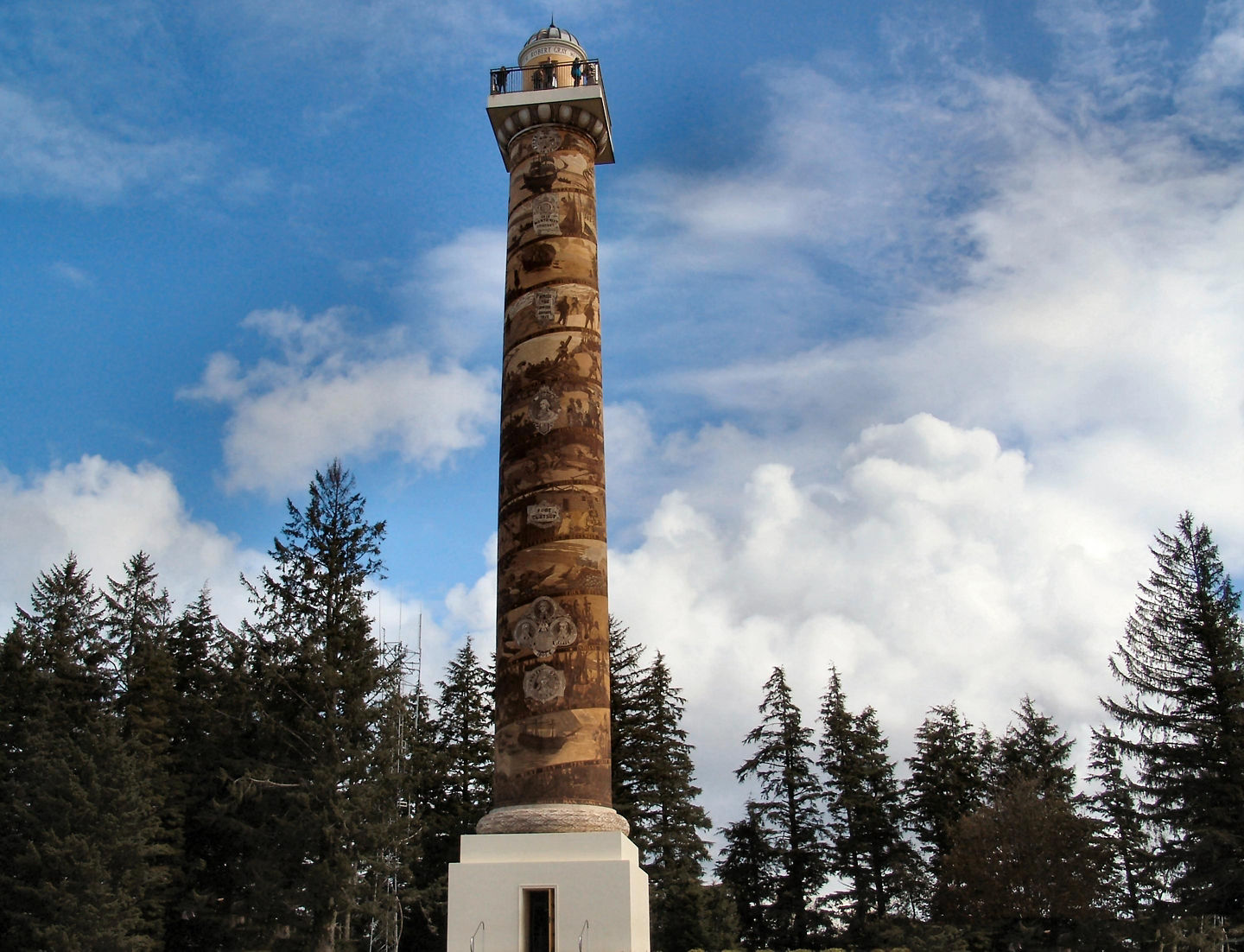Astoria Column rises above trees. - Astoria, Oregon