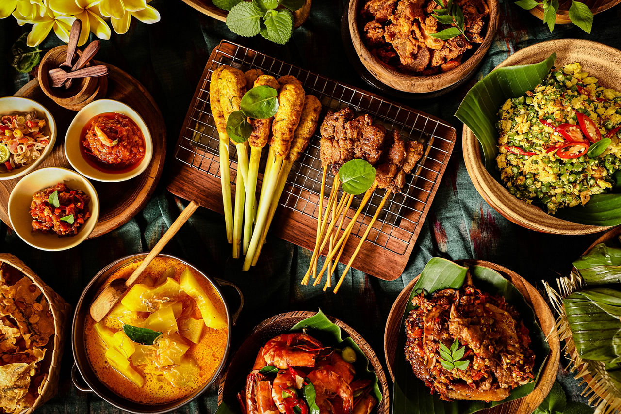 Festive Balinese Rijsttafel with Traditional Indonesian Food Dishes. 