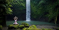 Yoga in the green forest. Bali, Indonesia.