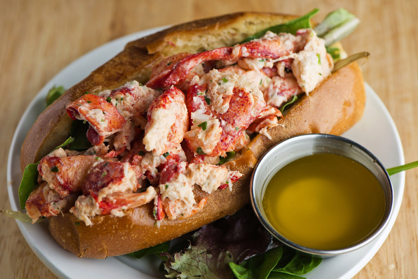 A buttery lobster roll is filled with fresh Boston lobster, served in a toasted split‑top bun. - Boston, Massachusetts
