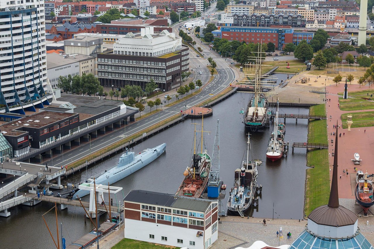 Cityscape seen from above, with a U-boat in the harbor of Bremerhaven, Germany