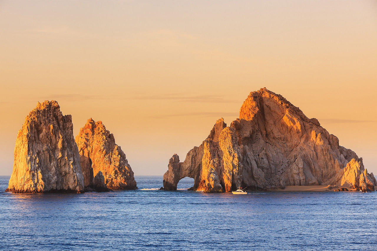 The arch of Cabo San Lucas at sunrise. Mexico.