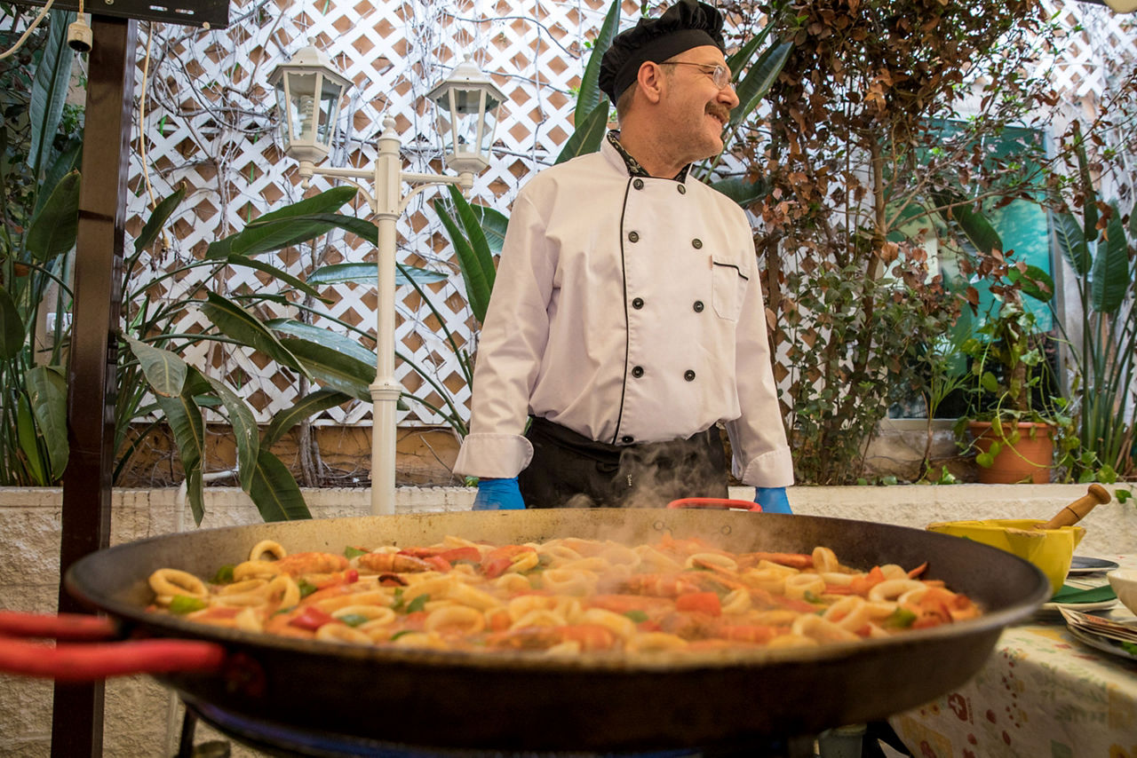 Chef Making Traditional Spanish Paella