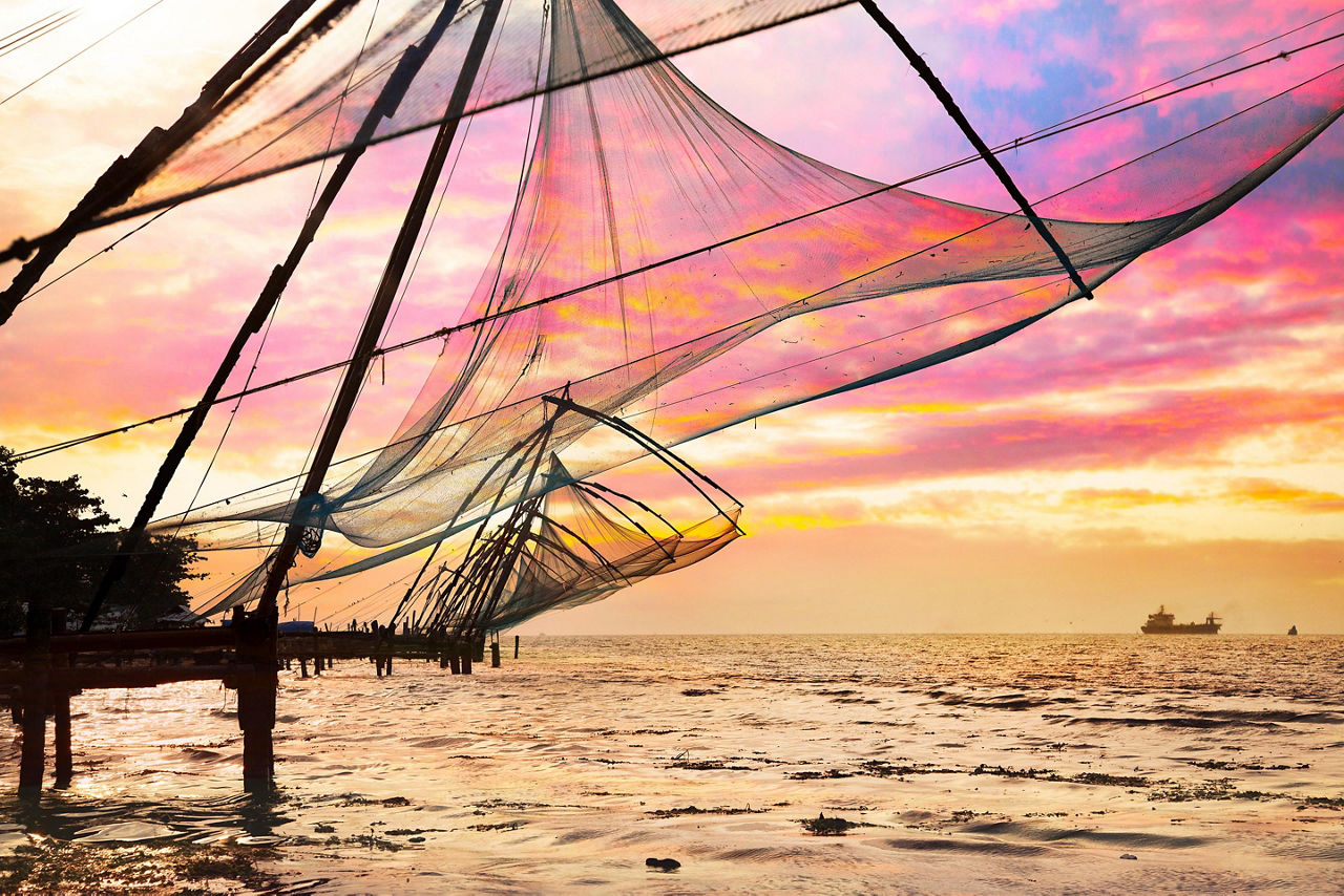 Chinese fishing nets hanging over the ocean in Cochin, India