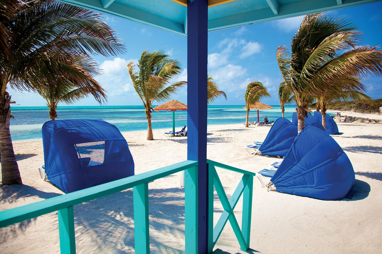 Relaxing Umbrella Shade Tanning Chairs Beach, CocoCay, Bahamas