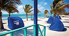 Relaxing Umbrella Shade Tanning Chairs Beach, CocoCay, Bahamas