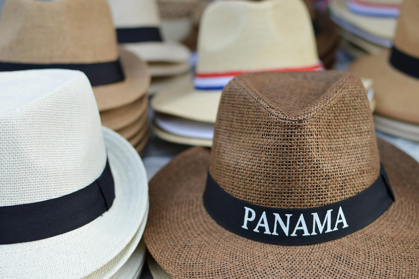 Panama hats originate in Ecuador, crafted from toquilla straw, and became famous through Panama exports. - Colón, Panama