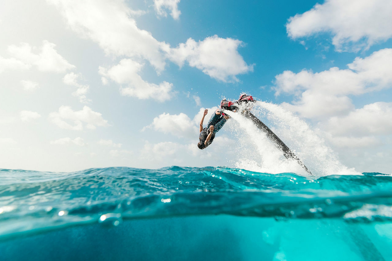 Man Flyboarding and Diving, Cozumel, Mexico
