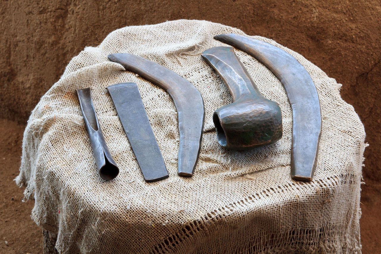 An assortment of five different bronze age tools