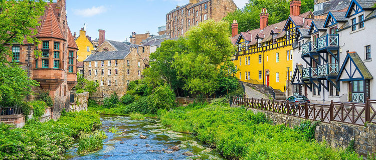 A river running through scenic Dean Village in Edinburgh, Scotland
