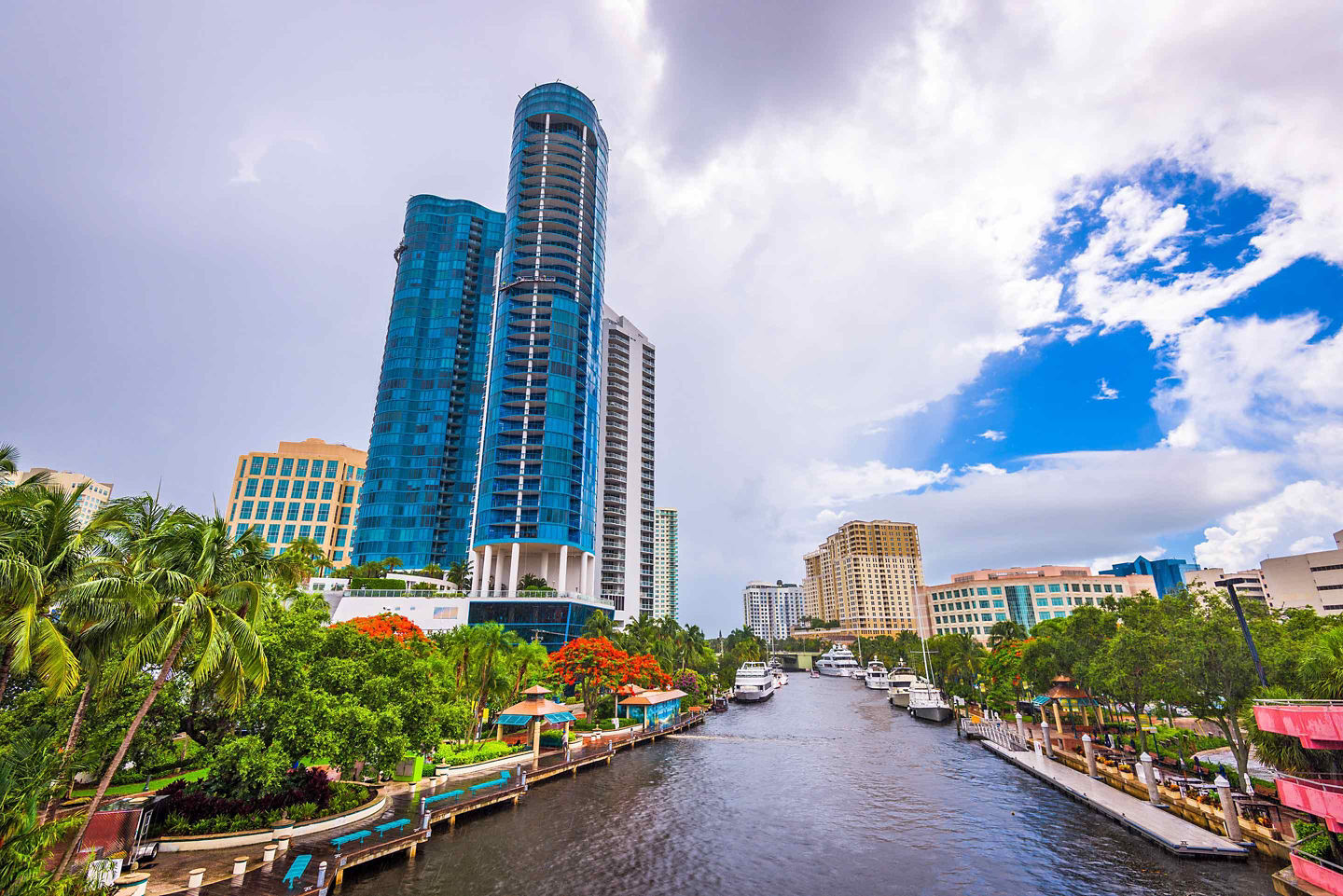 Fort Lauderdale Riverwalk lined with high-rise buildings along a waterfront canal. - Fort Lauderdale, Florida