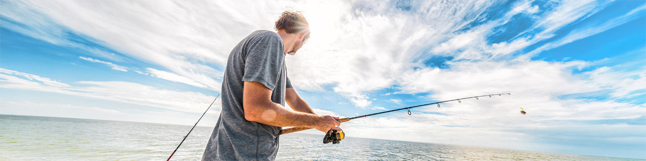 Man fishing in the open waters.