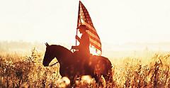 Texas rancher portrait with USA flag. Galveston