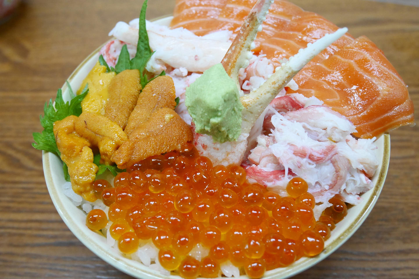 Morning Market featuring Kaisendon, seafood bowl of crab, tobiko caviar, tuna, and more. - Hakodate, Japan
