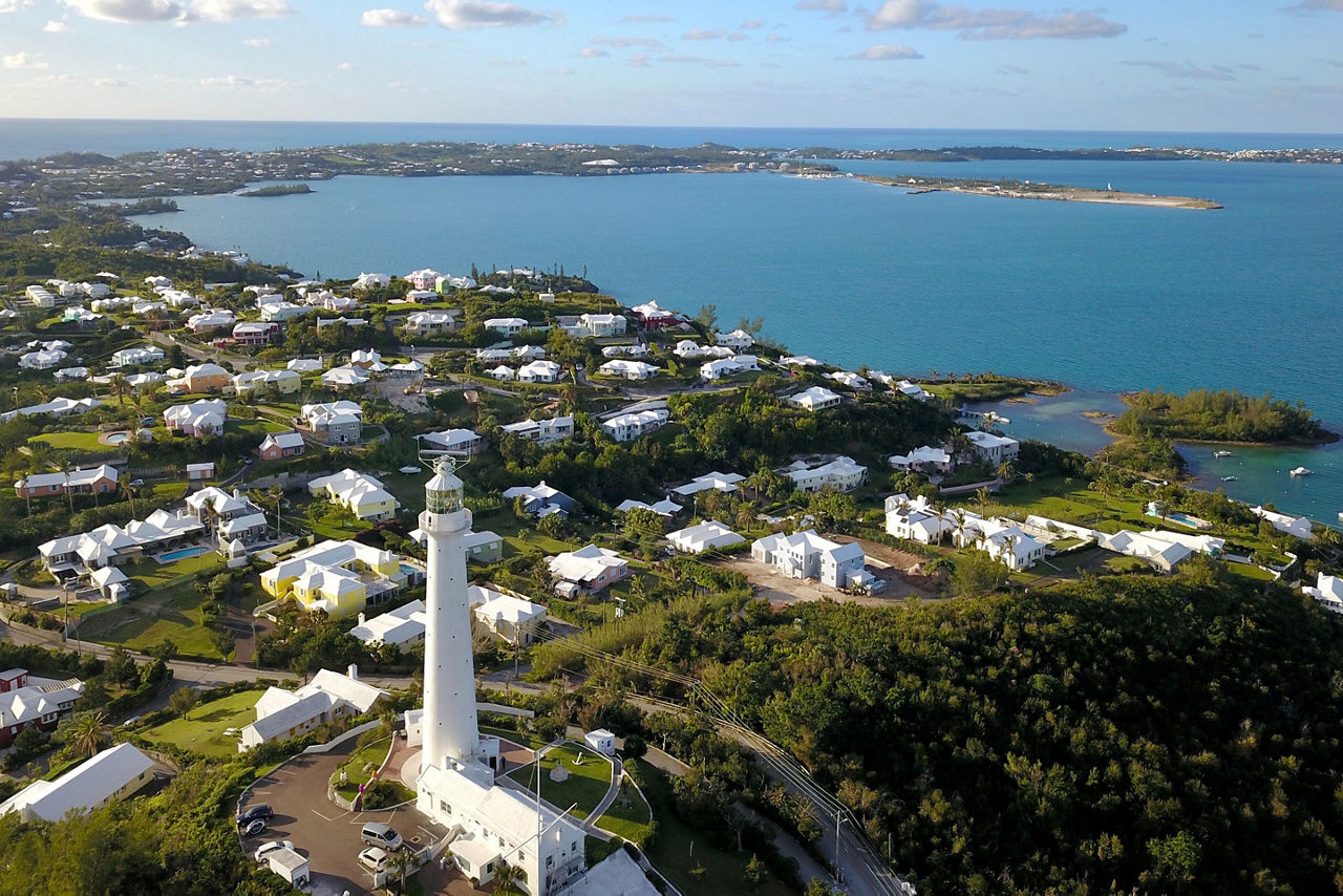 The drone aerial view of Bermuda islands and the Gibbs hill lighthouse. The Lighthouse is one of the first lighthouses in the world to be made of cast-iron.