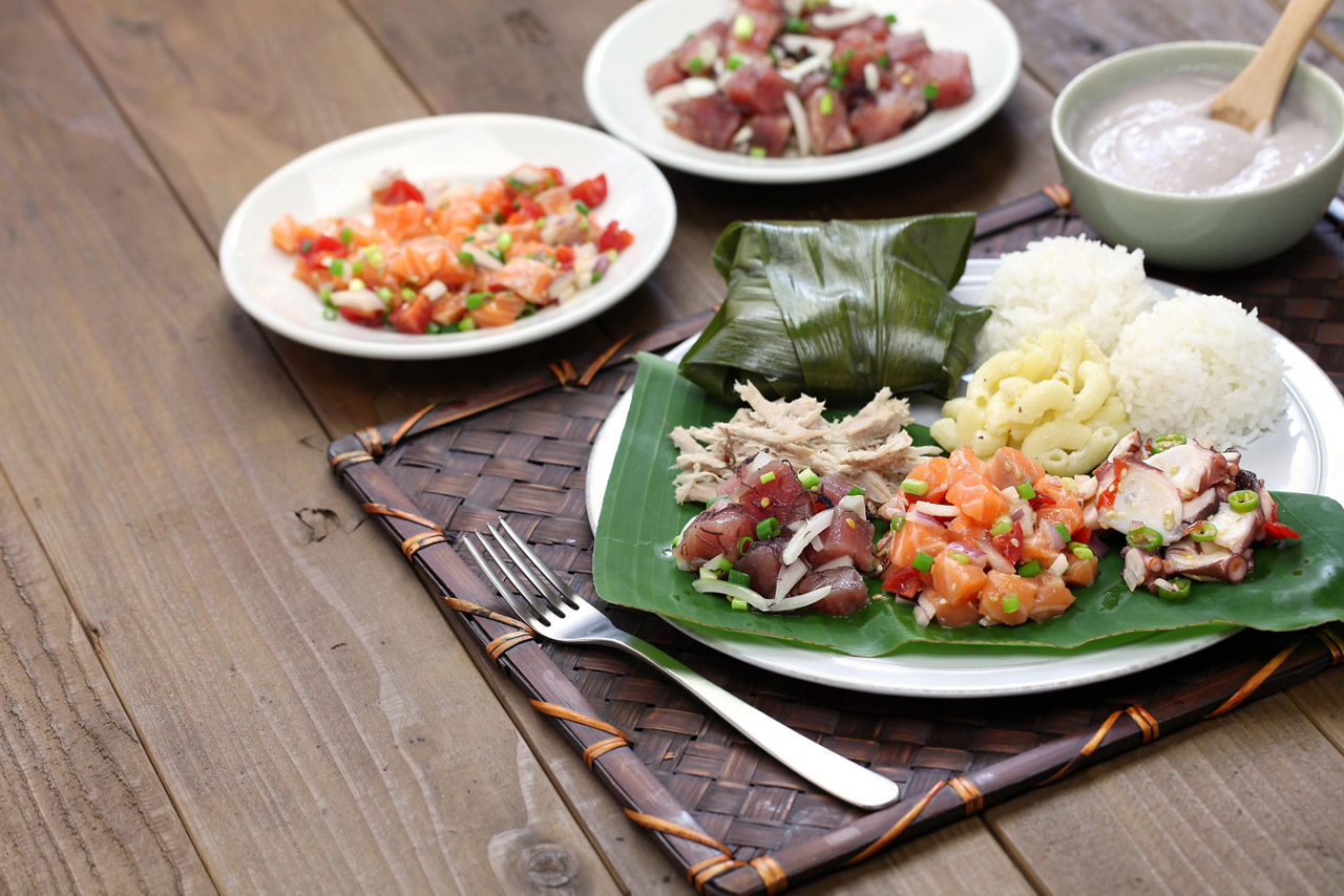 A plate of traditional Poke with white rice in Hawaii