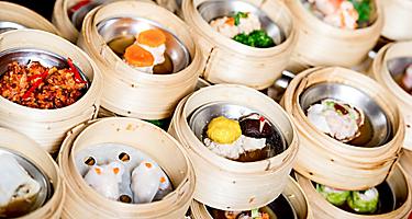 Delicious array of dim sum in bamboo steamers in Hong Kong, China
