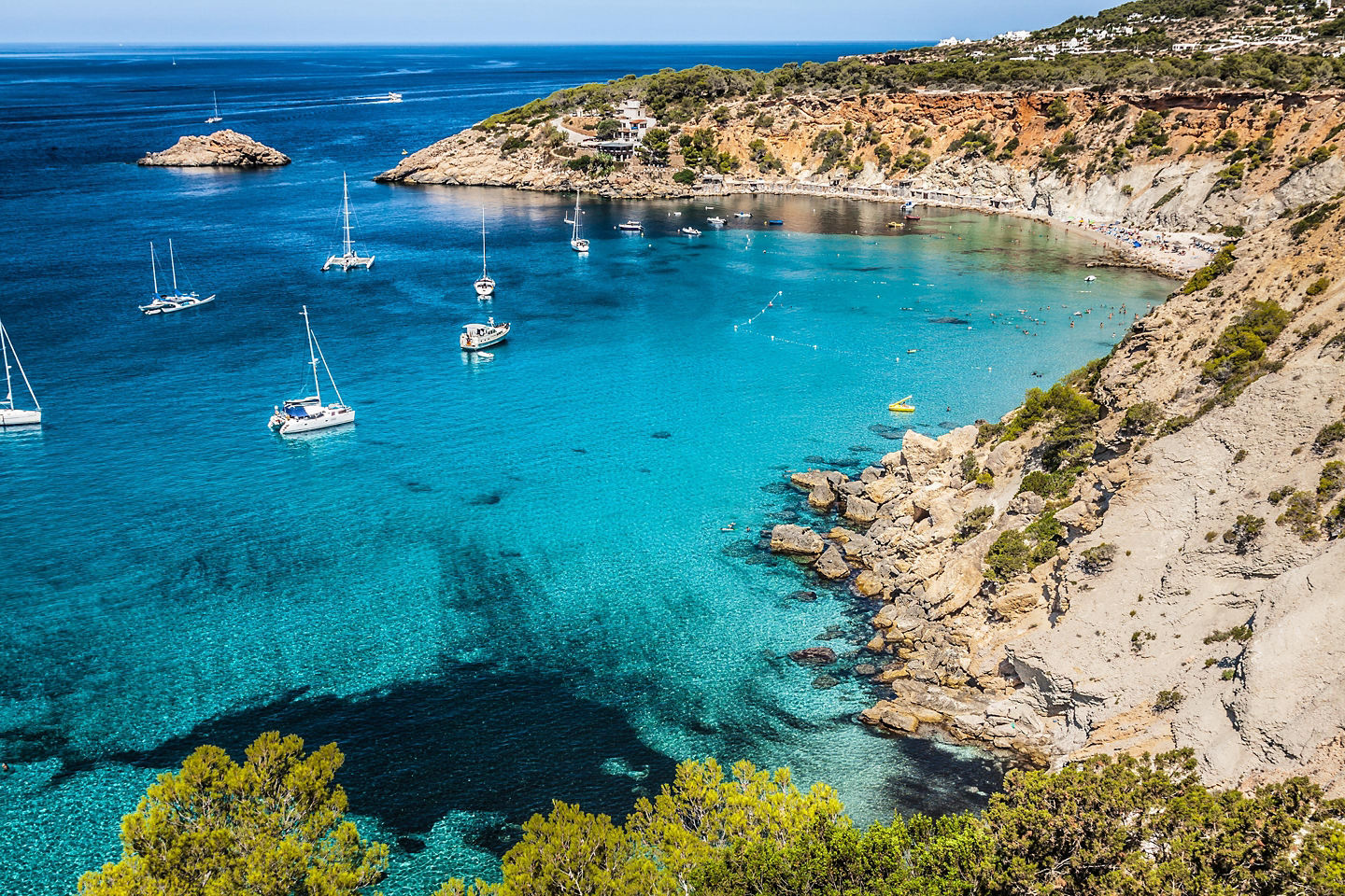 Es Vedrà rises sharply from the sea. - Ibiza, Spain