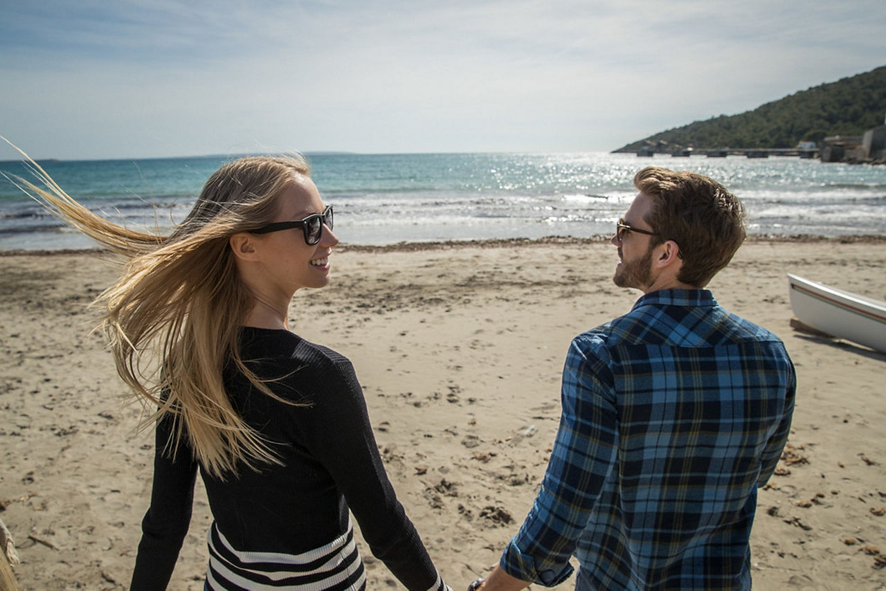 Spain Ibiza Beach Coast Line Couple on a Romantic Stroll