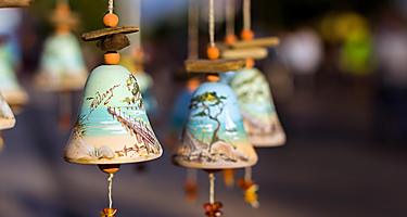 An assortment of traditional souvenir bells