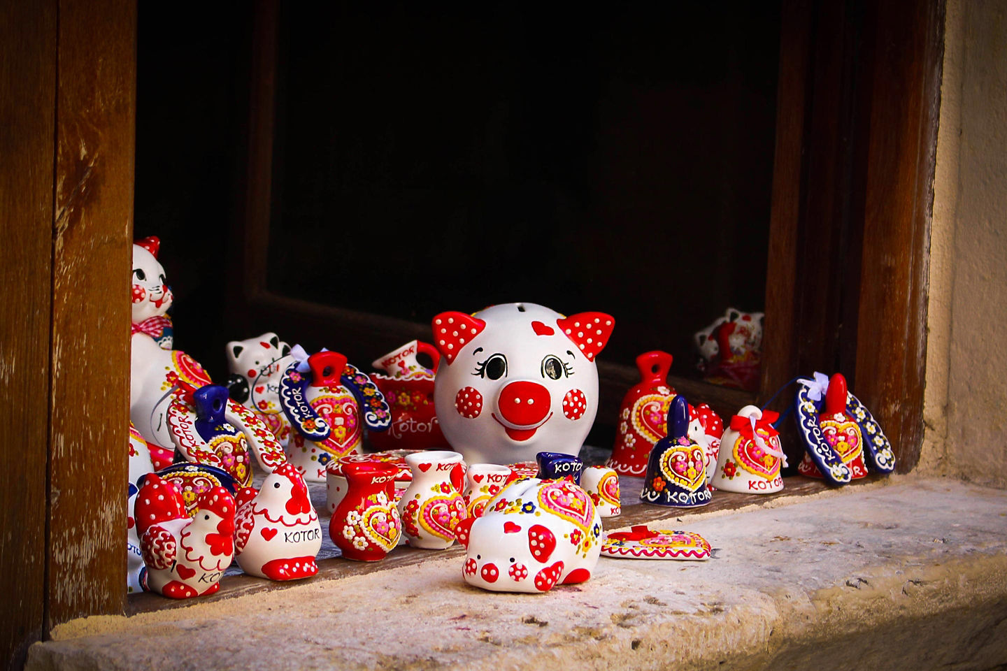 Montenegrin pottery features hand-painted, nautical, village, and traditional earthy designs. - Kotor, Montenegro