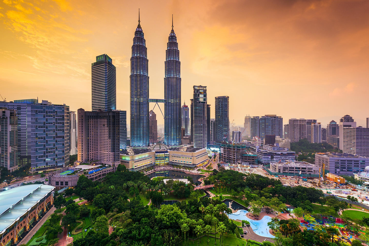 Kuala Lumpur’s skyline rises above the city, with the Petronas Towers standing prominently. - Kuala Lumpur, Malaysia