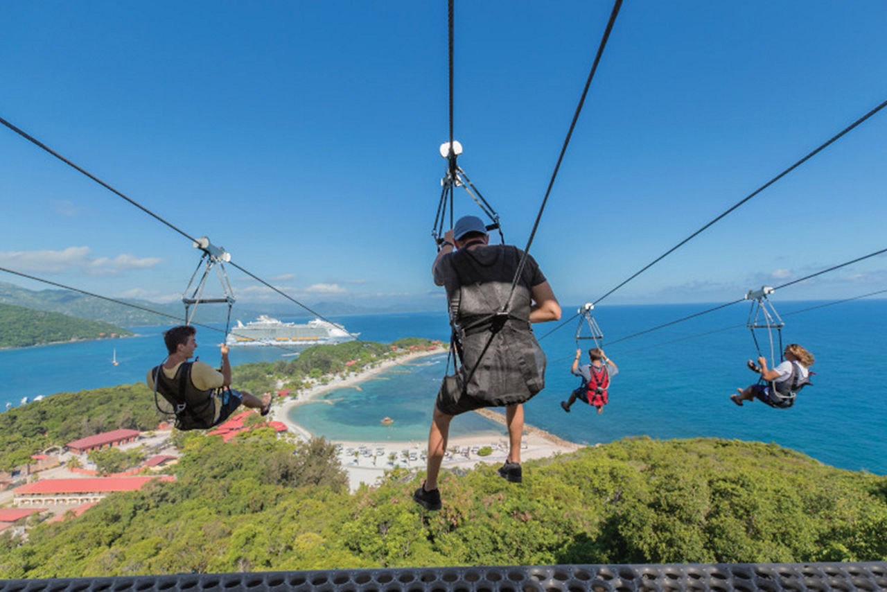 Friends Racing down the Dragon's Breathe Zip line 