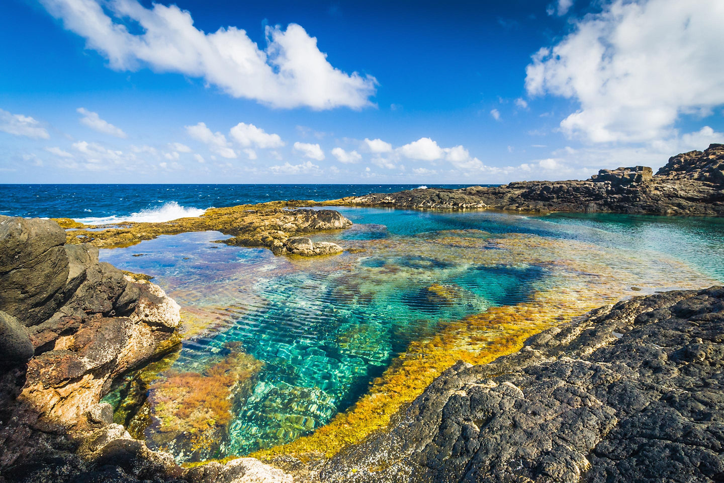 Natural volcanic coastal pool with turquoise water and rocks. - Lanzarote, Canary Island