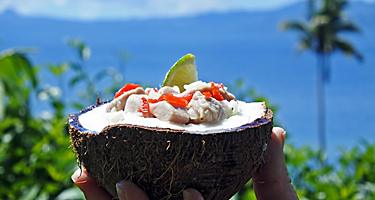 A coconut filled with Kokoda, a raw fish salad