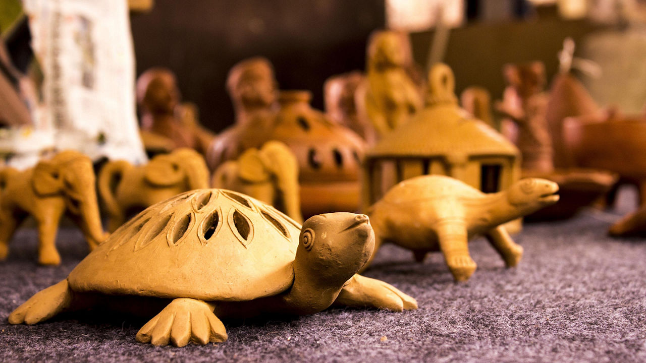 A handcrafted wooden turtle souvenir