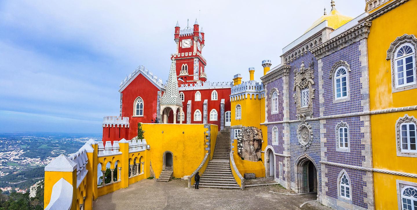 Colorful Pena Palace perched on hilltop. - Lisbon, Portugal
