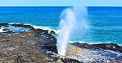 Hawaiian blow hole on Maui with a gorgeous blue ocean in the background