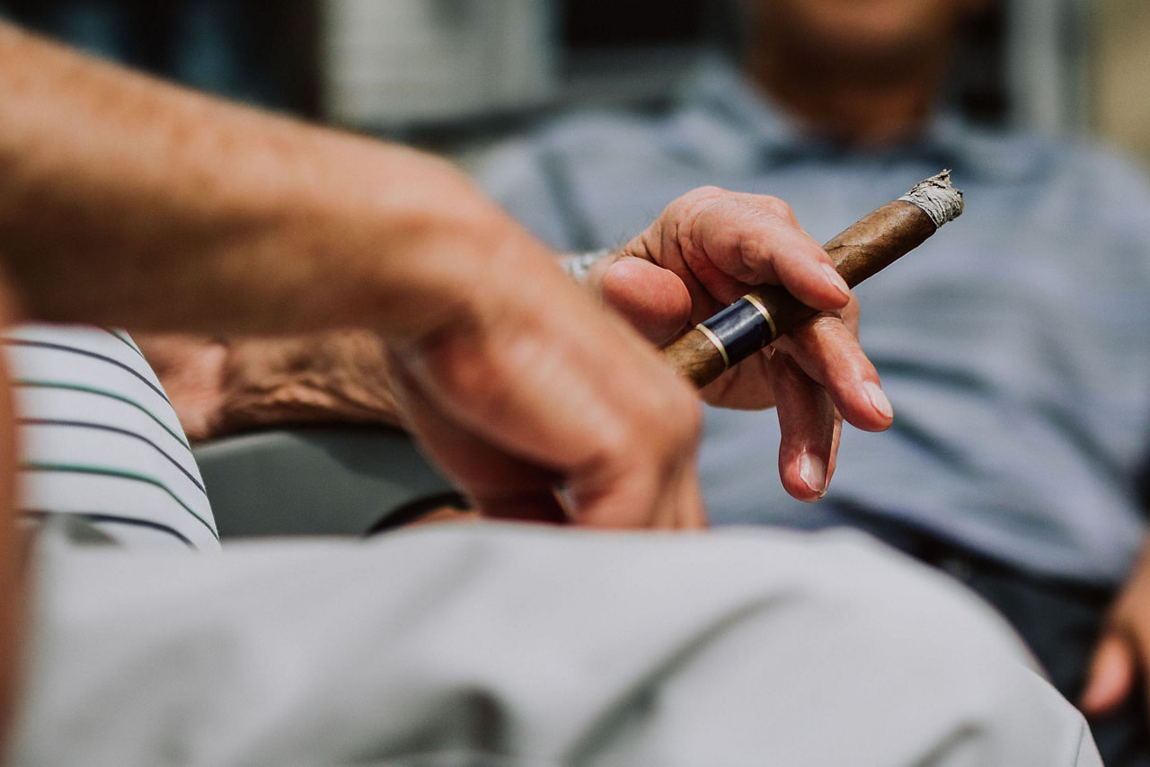 Older Men Close Up Smoking Cuban Cigars, Miami, Florida