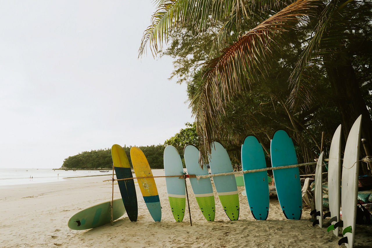 best relaxing beach to visit with surfboards lining the shoreline. Florida.